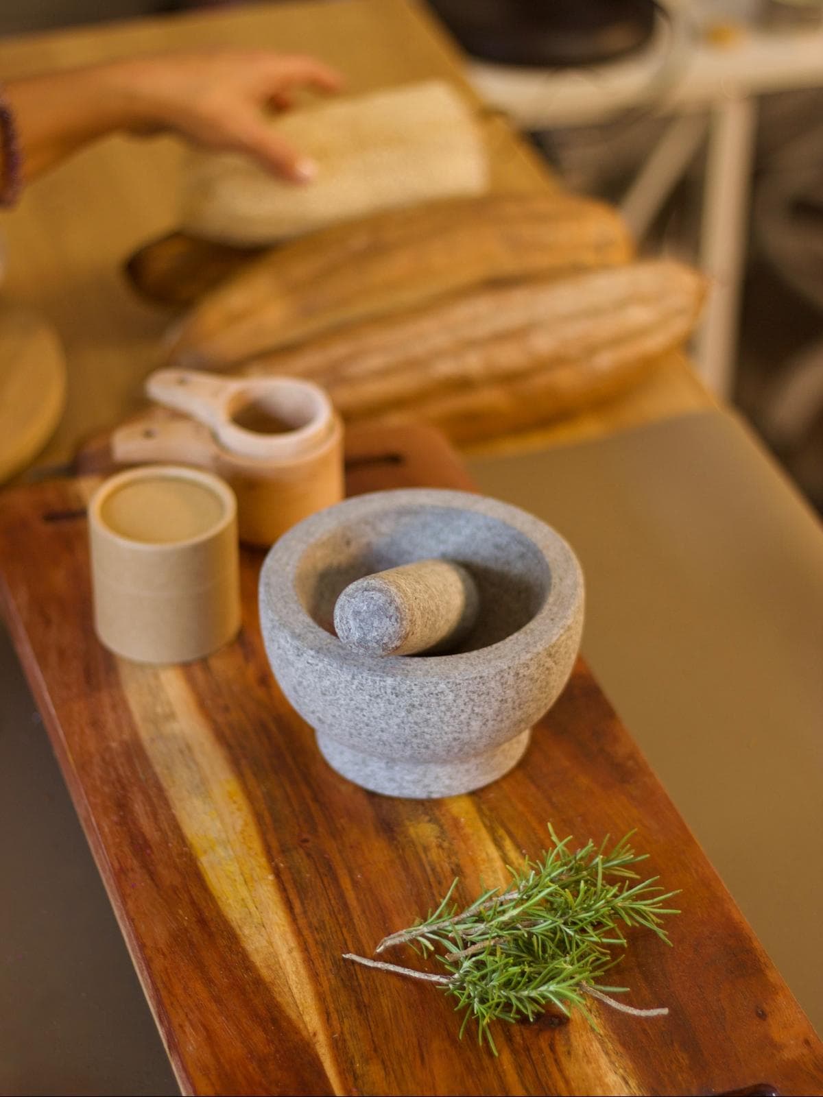 Fresh herbs and stone mortar, the botanical side of Rooted Method